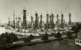Cagemast forest in Philadelphia Navy Yard.<br>Decomissioned pre-dreadnoughts may seem to be in a perfect shape but their time is over. Photo taken on October 22, 1919.<br>Source: <a href="http://www.reddit.com/r/WarshipPorn/comments/fatrks/4423x2347_cagemast_forest_planted_in_philadelphia/?utm_source=share&utm_medium=web2x" target="_blank">http://www.reddit.com/r/WarshipPorn/comments/fatrks/4423x2347_cagemast_forest_planted_in_philadelphia/?utm_source=share&utm_medium=web2x</a> <br>